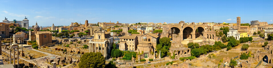 Fototapeta na wymiar Ruins of the Roman Forum panorama at Palatino hill in Roma, Italy, Europe. Famous travel destination. Italian ancient roman architecture aerial view. Landmarks in eternal city. Summer holidays.