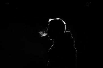 Sillouette of a man in low key