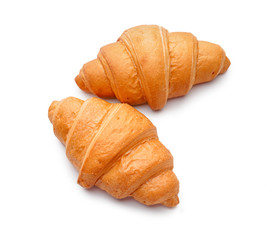 Tasty croissants on white background