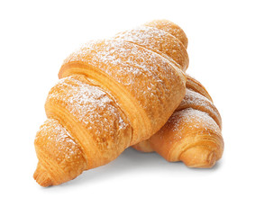 Tasty croissants on white background