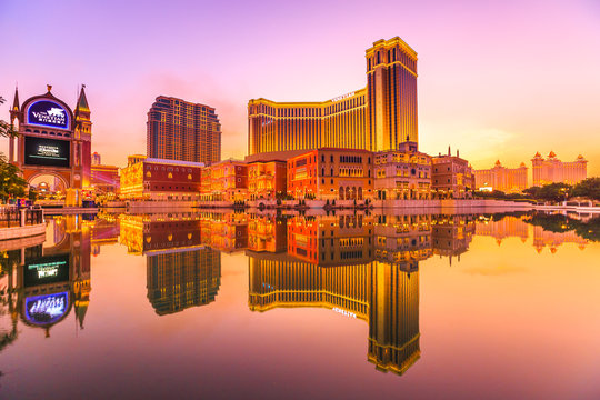 Macau, China - December 8, 2016: The Venetian Macao Sunset reflecting in the lake. The largest casino in the world.