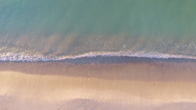 Tropical beach aerial view, Top view of waves break on tropical white sand beach