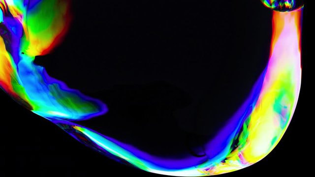 Colorful 3D Abstract Animated Background. Motion Transparent Multicolored Glass Sphere in Dark Space. Active Move Liquid Colored Bubble. Dynamic Waving Spherical Spectral Color Gradient. Concept Art