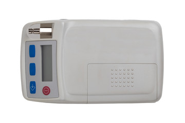 Blood pressure monitor. Close-up of an outpatient 24 hours blood pressure monitor system isolated on a white background. Macro photograph. Health care prevention.
