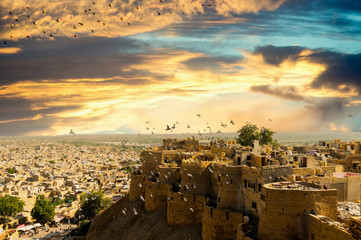 Aerial shot of a fort perched on a mountain top