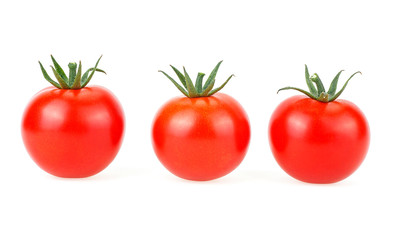 Three fresh tomatoes isolated on a white background