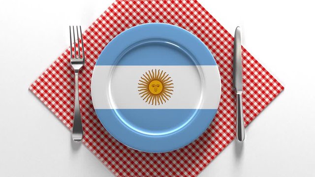 National cuisine and dishes of Argentina. Delicious recipes from Europe. Flag on a plate with food from Argentina.