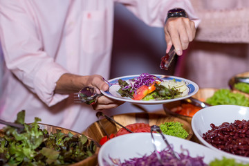 Food Buffet Catering Dining Eating Party Sharing Concept.people group catering buffet food indoor in luxury restaurant with meat colorful fruits and vegetables