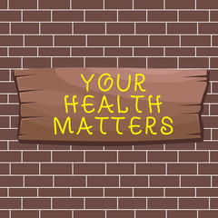 Text sign showing Your Health Matters. Business photo showcasing good health is most important among other things Plank wooden board blank rectangle shaped wood attached color background