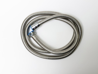 Steel water shower hose isolated on white background.