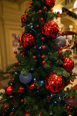 Christmas decorations on the Christmas tree. Red ball.