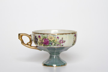 antique cup isolated on white background