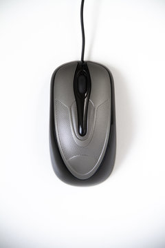 black computer mouse isolated on white background