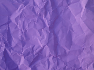 Purple crumpled paper. Background and texture,