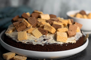 Chocolate cake with cookies on top
