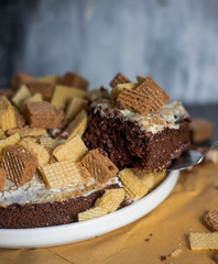 Chocolate cake with cookies on top