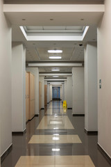 Empty long office corridor