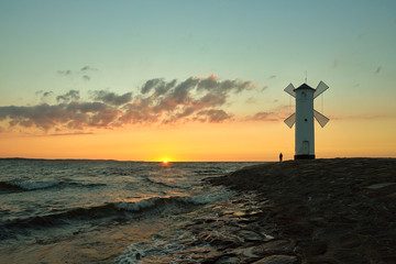 Lighthouse windmill Stawa Mlyny, Swinoujscie, Baltic Sea, Poland.