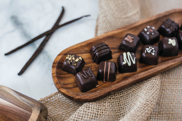 Dark Chocolate Truffles on Marble Background