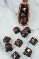 Dark Chocolate Truffles on Marble Background