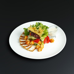 Dishes of traditional Russian cuisine. Restaurant serving. Black background.