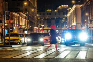 Plakat Moscow, Russia - October, 28, 2019: image of pedestrians crossing Moscow street in the evening