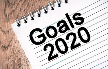 New Year's list of goals for 2020. Text on notepad
