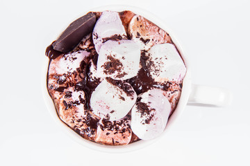 Cup of hot chocolate with marshmallows on a white background