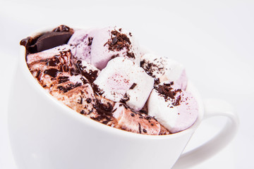 Cup of hot chocolate with marshmallows on a white background
