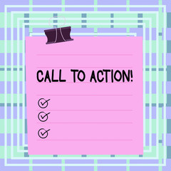 Text sign showing Call To Action. Business photo text exhortation do something in order achieve aim with problem Paper lines binder clip cardboard blank square notebook color background