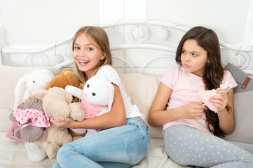 Thats not fair. Small children quarrel over toys. Quarrel and toy fighting. Sibling rivalry. Family...