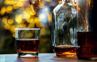  Whisky In A Glass. Light Bokeh Background. Out Of Focus.