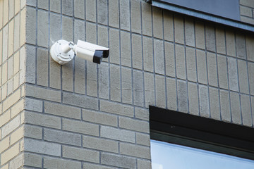 CCTV camera on facade of residential building
