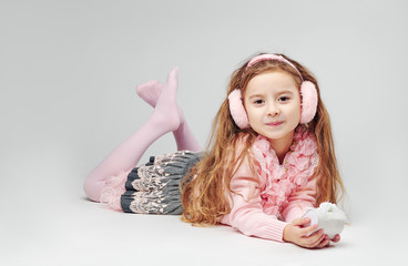 Girl in pink posing in front of the camera close-up