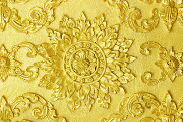 Golden stucco floral for decoration  background