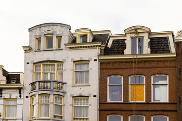 Fototapeta premium Amsterdam architecture features traditional white red house