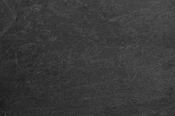 Dark grey black slate background or texture.