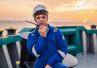 Marine Deck Officer or Chief mate on deck of offshore vessel or ship , wearing PPE personal...