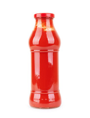 Tomato sauce in a glass jar on a white background