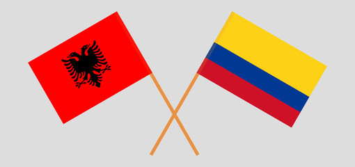 Crossed flags of Colombia and Albania