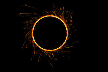 Circle of flames of Bengal fire, on black background