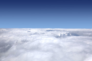 Beautiful landscape from the airplane window to the skyline and white clouds