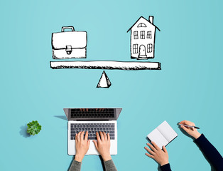 Work and life balance with people working together with laptop and notebook
