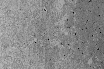 Abstract concrete texture gray background. Chips, cracks, pores in concrete