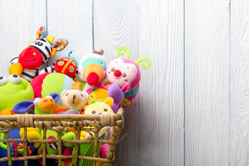 Kids educational developing toys frame on white background. Top view. Flat lay. Copy space for text