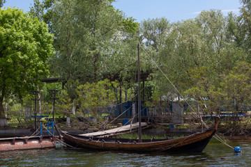 Fototapeta na wymiar Old Boat on the Banks of the Kherson River, Ukraine