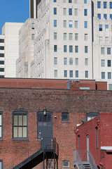 A congested urban center with buildings seemingly stacked on top