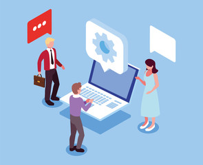 group of people working in front of laptop