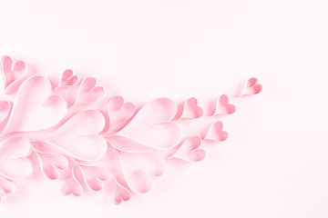 Fototapeta na wymiar Pink paper hearts on Light pink pastel paper background. Love and Valentine's day concept.