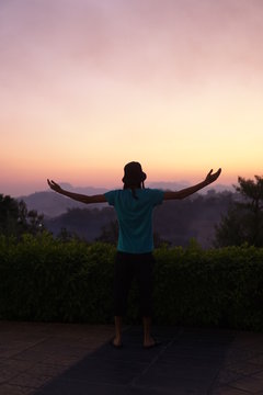 silhouette of man with sunset